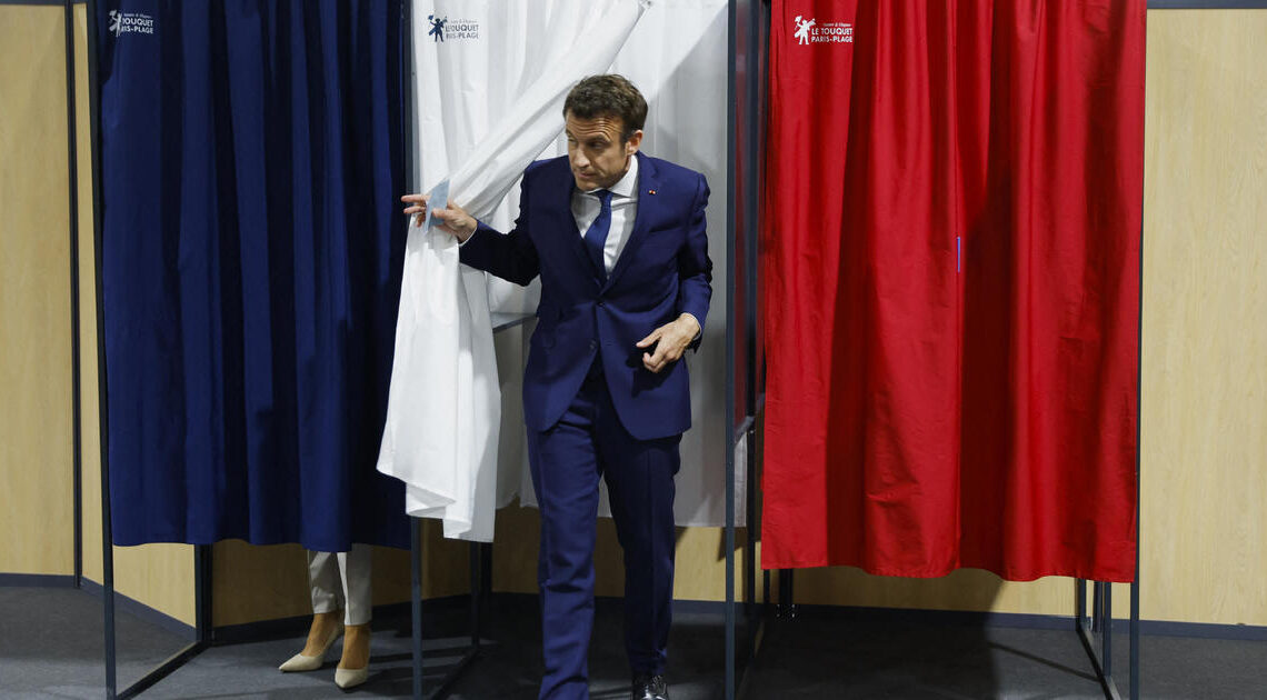 Macron and Le Pen square off in French presidential election as voters head to polls