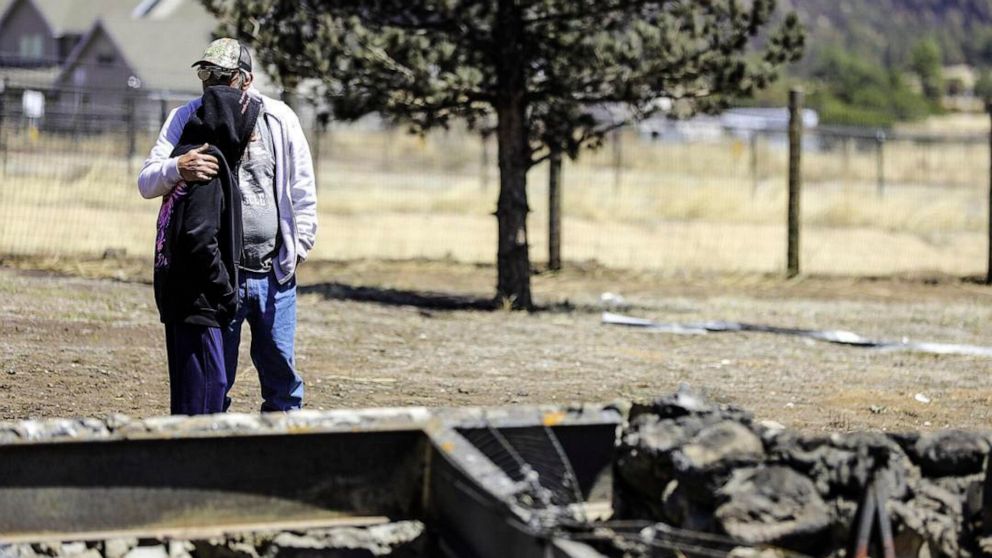 Progress made on wildfires, but high winds threaten efforts
