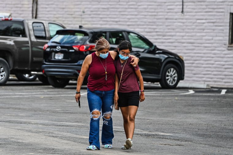 Mourners leave Hillcrest Memorial Funeral Home in Uvalde, Texas, on May 30, 2022, during the visitation for Amerie Jo Garza.