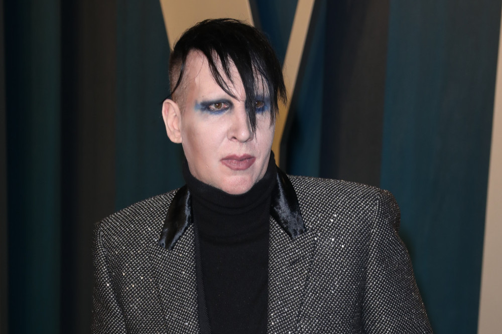 A judge has dismissed a lawsuit filed against Marilyn Manson by his former assistant