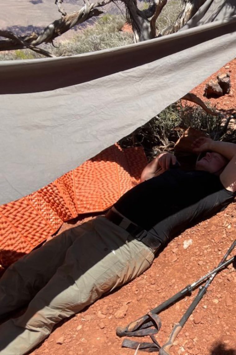 To help the sick hiker, friends and Key put up a tarp to keep him cool in the shade while they awaited his rescue in the Grand Canyon.