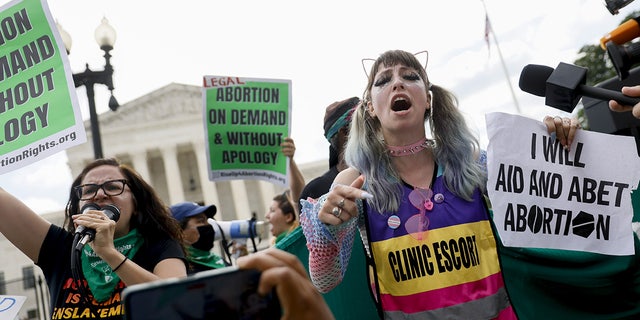 Abortion-rights demonstrators protest outside the U.S. Supreme Court in Washington, D.C., Friday, June 24, 2022.