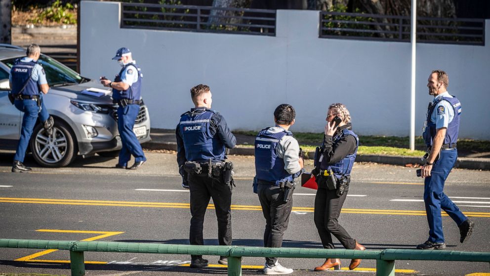 Police set up cordons and search area around a suburb of Auckland following reports of multiple stabbings, in New Zealand, Thursday, June 23, 2022. Authorities say a man wounded some people in a stabbing rampage in a New Zealand city before bystander