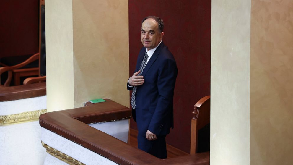 Gen. Maj. Bajram Begaj salutes the members of the Parliament after being elected as president, in the Parliament, in Tirana, Albania, Saturday, June 4, 2022. (AP Photo/Franc Zhurda)