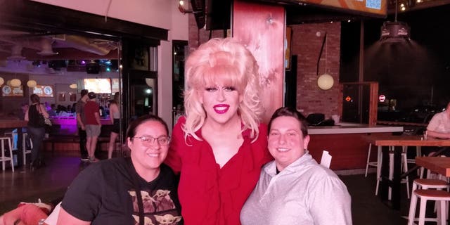 Drag performer Richard Stevens, center, as Barbra Seville