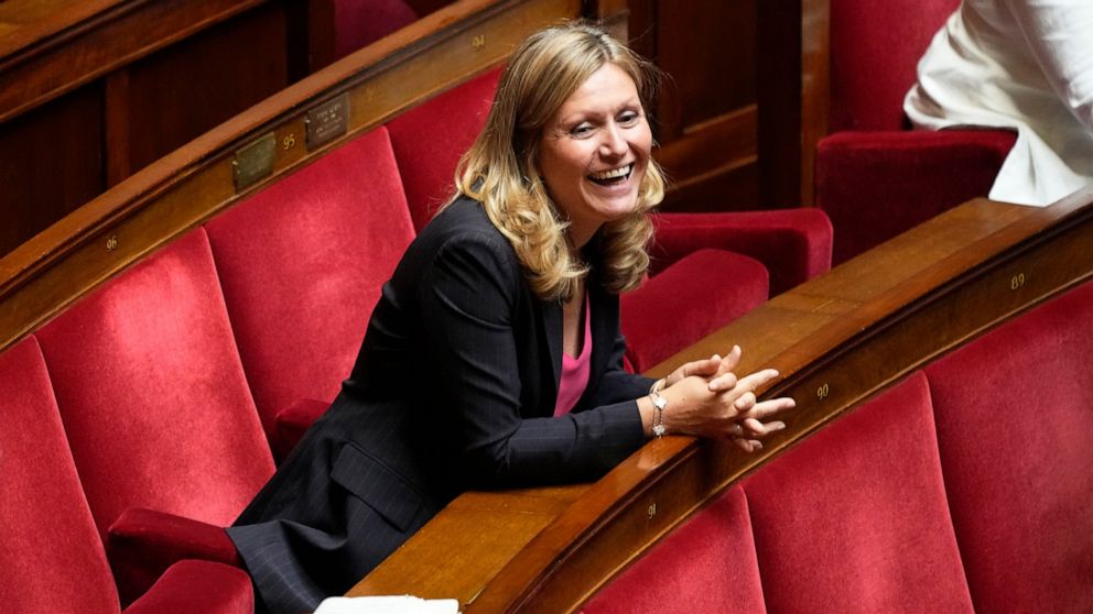 Yaël Braun-Pivet, a member of the centrist alliance Ensemble (Together) smiles at the National Assembly, Tuesday, June 28, 2022 in Paris. France's lower house of parliament opened its first session since President Emmanuel Macron's party lost its maj