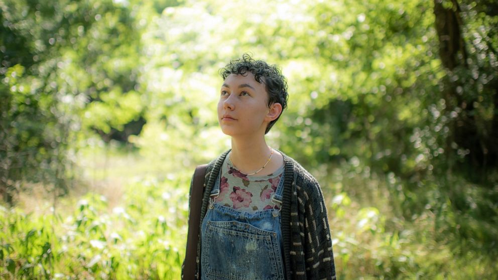 Roswell Grey, 16, poses at Fairview Park in Sherman, Texas, Thursday, June 23, 2022. LGBTQ youth of faith across the United States are sharing their stories during Pride Month. They hope to encourage others to embrace their religious and gender ident