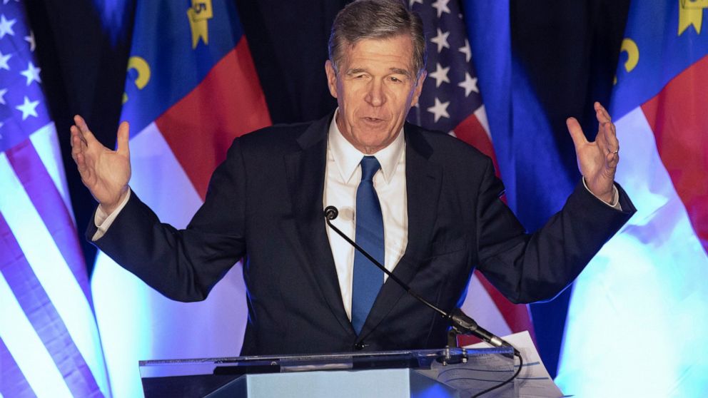 FILE - North Carolina Gov. Roy Cooper speaks at a primary election night event hosted by the North Carolina Democratic Party in Raleigh, N.C., May 17, 2022. Gov. Cooper said Monday, June 20, 2022 that he has tested positive for COVID-19 but is contin