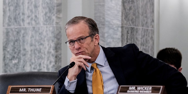 FILE: U.S. Senator John Thune (R-SD) listens during a Senate Commerce, Science, and Transportation Committee hearing on President Biden's proposed budget request for the Department of Transportation, on Capitol Hill in Washington, U.S., May 3, 2022. 