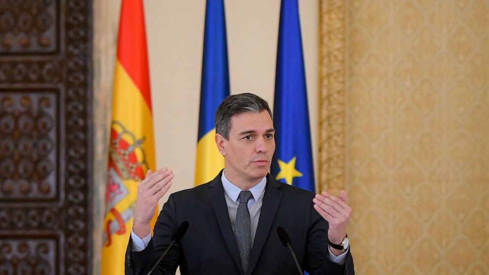 FILE - Spain's Prime Minister Pedro Sanchez gestures during news conference at the Presidential Palace in Bucharest, Romania, on March 17, 2022. The Spanish government has approved a package of emergency economic measures worth more than 9 billion eu