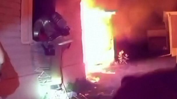 WATCH:  Emergency workers rescue toddler from burning home