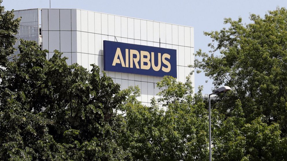 FILE - The logo of Airbus group is displayed in Toulouse, south of France, July 9, 2020. Airbus said net income plunged in the second quarter of 2022 and warned that supply chain challenges were leading it scale back production targets for its commer