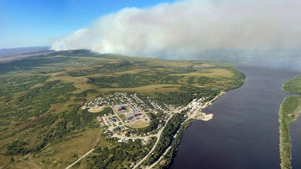 FILE - This aerial photo provided by the Bureau of Land Management Alaska Fire Service shows a tundra fire burning near the community of St. Mary's, Alaska, on June 10, 2022. Alaska's remarkable wildfire season includes over 530 blazes that have burn