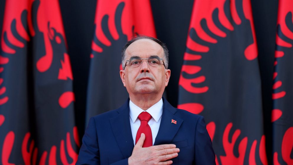 Newly appointed Albanian President Bajram Begaj stands during an inauguration ceremony at the Presidential palace, in Tirana, Sunday, July 24, 2022. Albania's new president sworn in on Sunday calling on the country's political parties to cooperate an