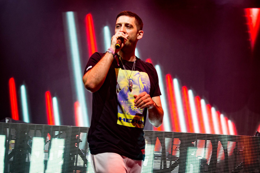 Example loves working in music