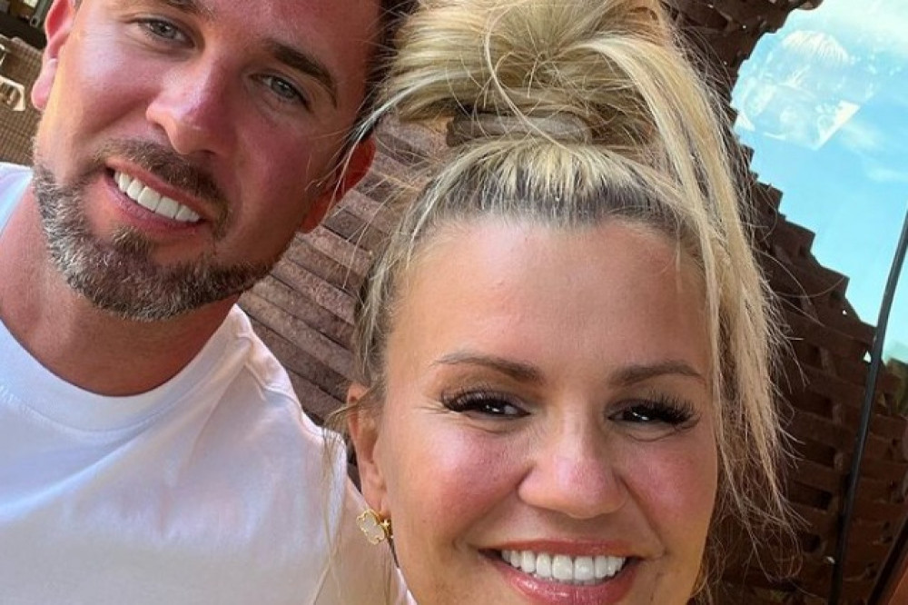 Kerry Katona insists her wedding to Ryan Mahoney hasn't been cancelled