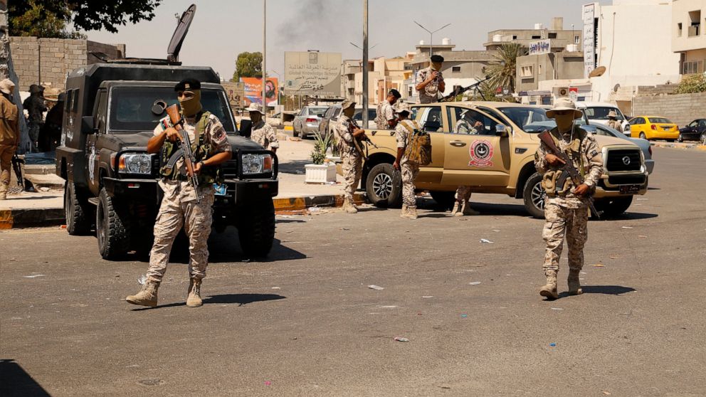 Libyan army forces and vehicles are stationed in a street in the country’s capital of Tripoli on Friday, July 22 2022. One of Libya’s rival governments on Friday called on militias to stop fighting, after clashes broke out in the country’s capital, T