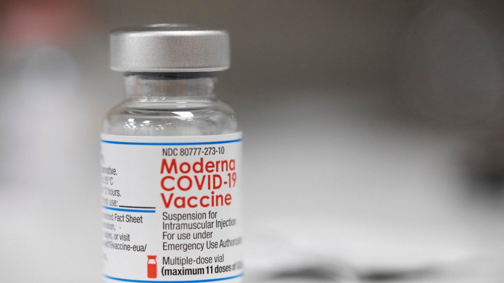 FILE - A vial of the Moderna COVID-19 vaccine is displayed on a counter at a pharmacy in Portland, Ore. on Dec. 27, 2021. The Biden administration said Friday it has reached an agreement to buy 66 million doses of Moderna’s next generation of COVID-1