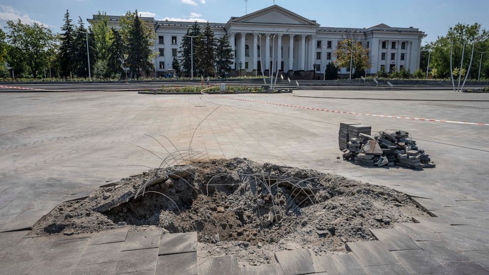 A crater in the aftermath of a Russian missile strike, in front of the city council hall building, in Kramatorsk city hall, eastern Ukraine, Saturday, July 16, 2022. Ukrainians living in the path of Russia's invasion in the besieged eastern Donetsk r