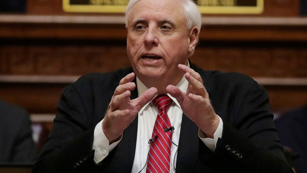 FILE - West Virginia Gov. Jim Justice delivers his annual State of the State address in the House Chambers at the state capitol in Charleston, W.Va., Jan. 8, 2020. Gov. Justice called on state lawmakers Wednesday, July 20, 2022, to meet at the Capito