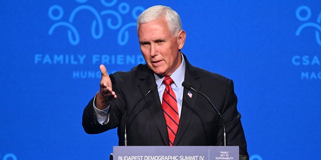 Former Vice President Mike Pence gives a speech on the stage of the Varkert Bazar cultural center in Budapest Sept. 23, 2021.