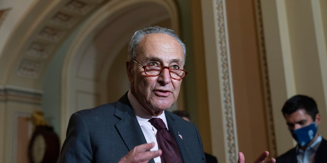 Senate Majority Leader Chuck Schumer of N.Y., speaks to the media after a Democratic policy luncheon, Tuesday, Oct. 19, 2021, on Capitol Hill in Washington.