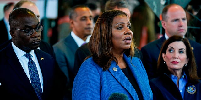 New York Attorney General Letitia James, center, accompanied by Buffalo Mayor Byron Brown, left, New York Gov. Kathy Hochul, right, and other officials, speaks with members of the media during a news conference on Sunday, May 15, 2022. 