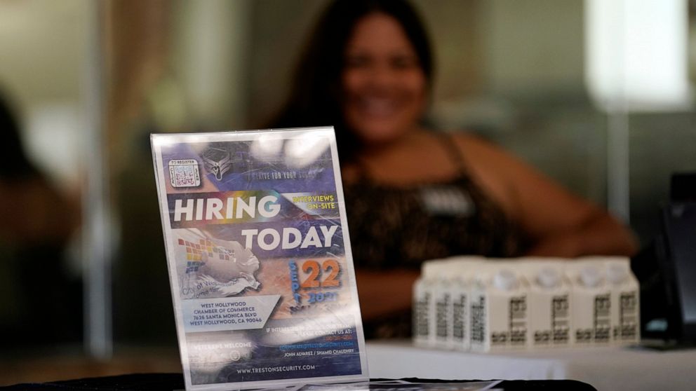 FILE - A hiring sign is placed at a booth for prospective employers during a job fair Wednesday, Sept. 22, 2021, in the West Hollywood section of Los Angeles. According to a new study released Monday, July 25, 2022, by the U.S. Census Bureau, by age