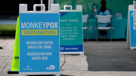 A sign announcing monkeypox vaccination is set up in Tropical Park by Miami-Dade County and Nomi Health, August 15, 2022.