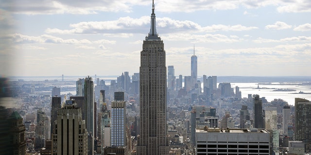 The Empire State Building towers above other office buildings on March 4, 2021, in New York City.