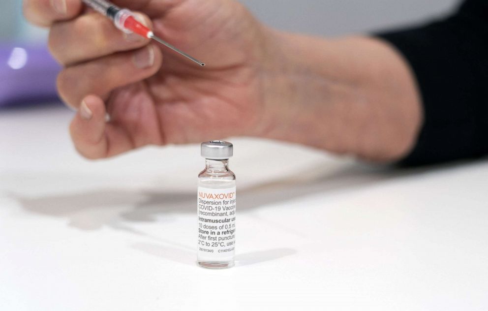 PHOTO: A healthcare worker prepares a dose of the COVID-19 vaccine from Novavax in Utrecht, Netherlands, March 15, 2022.