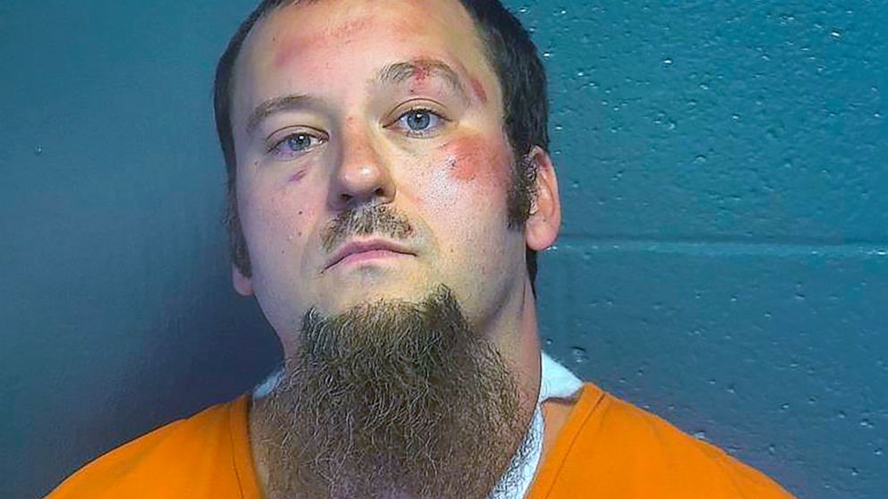 This image provided by the Oklahoma County Jail shows Benjamin Plank. An Oklahoma deputy sheriff remained hospitalized in stable condition Tuesday, Aug. 23, 2022 following a shooting that killed a fellow deputy in southwest Oklahoma City, authorities