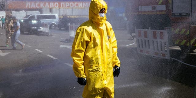 A Ukrainian Emergency Ministry rescuer attends an exercise in the city of Zaporizhzhia Aug. 17, 2022, in case of a possible nuclear incident at the Zaporizhzhia nuclear power plant located near the city.