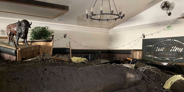 Doris Jagiello, 62, was found dead on Sept. 16 after a mudslide ripped through her home in the San Berardino Mountains. Pictured: Damage from a mudslide inside the Oak Glen Steakhouse and Saloon in Oak Glen, California, on Sept. 14, 2022.