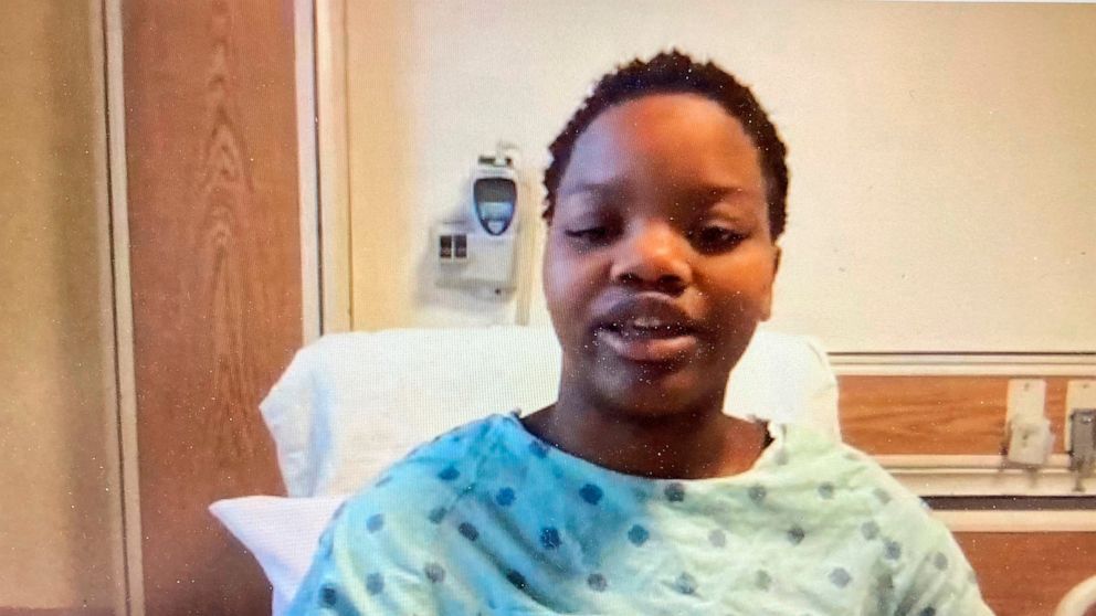 FILE - In this image taken from a video screen, Tafara Williams speaks to reporters from her hospital bed during a Zoom meeting Tuesday, Oct. 27, 2020, in Libertyville, Ill. A suburban Chicago police officer who shot a Black couple inside a vehicle —