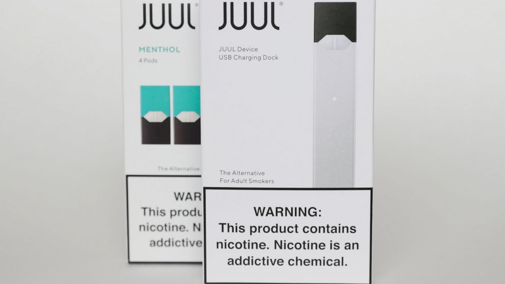 FILE - Packaging for an electronic cigarette and menthol pods from Juul Labs is displayed on Feb. 25, 2020, in Pembroke Pines, Fla. In a deal announced Tuesday, Sept. 6, 2022, electronic cigarette maker Juul Labs will pay nearly $440 million to settl