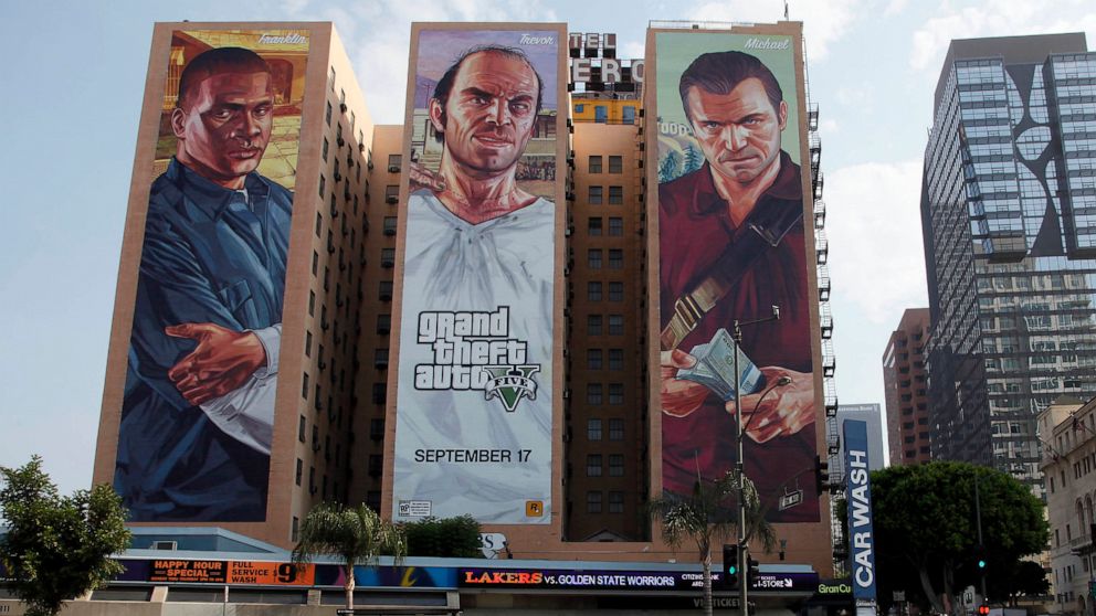 FILE - A "Grand Theft Auto V" billboard is displayed at Figueroa Hotel on Sept. 10, 2013, in Los Angeles. Video game producer Rockstar Games said Monday, Sept. 19, 2022, that early development footage from the next version of its popular title Grand