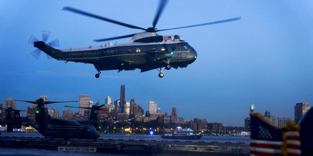 President Joe Biden aboard Marine One arrives at the Wall Street Landing Zone in New York, Thursday, Oct. 6, 2022, to attend a Democratic Senatorial Campaign Committee reception. 