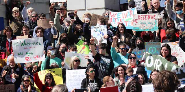 Native American protesting Maine schools