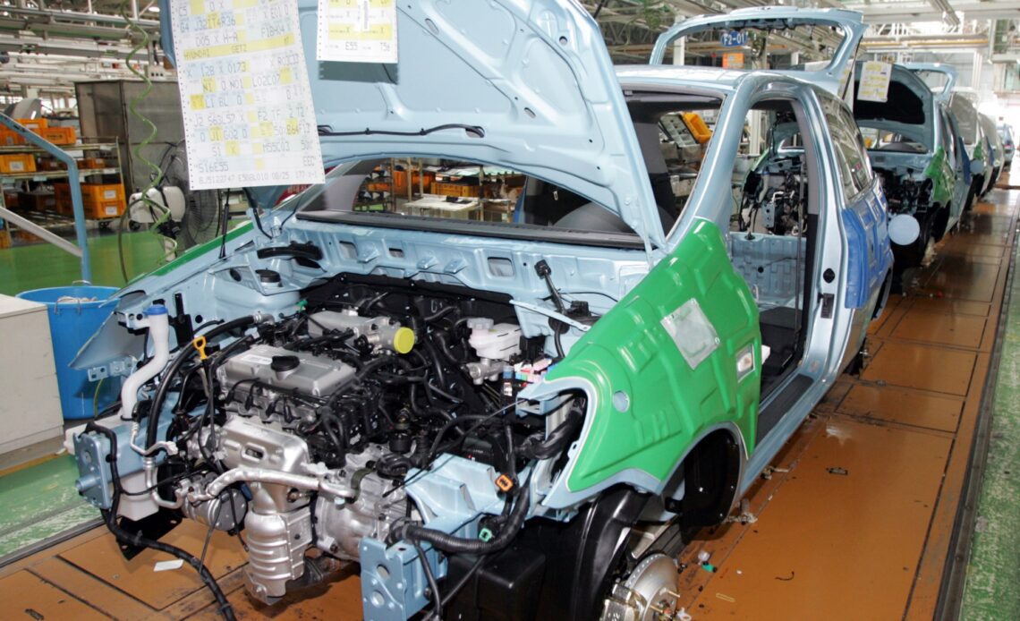 Asia’s factories hit by global slowdown, China’s COVID curbs | Business and Economy