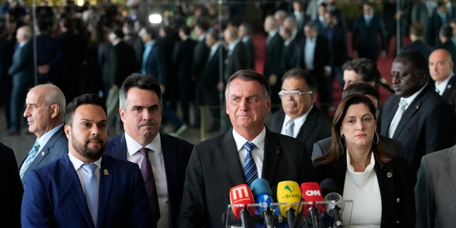 Brazilian President Jair Bolsonaro speaks from his official residence of Alvorada Palace in Brasilia, Brazil, Tuesday, Nov. 1, 2022, the leader's first public comments since losing the Oct. 30 presidential runoff.