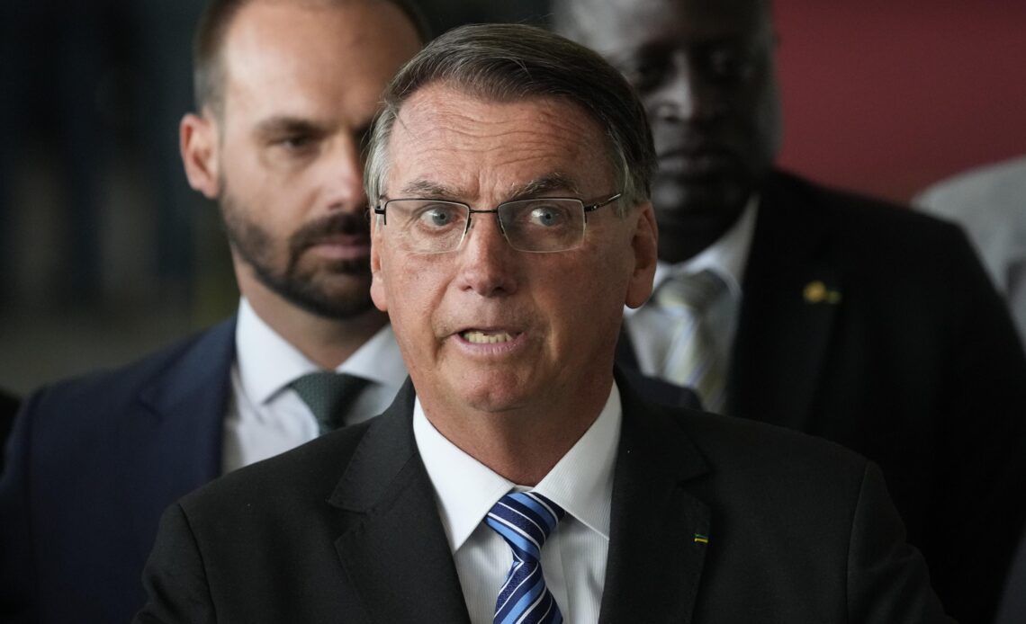 Brazil's Bolsonaro declines to concede, but OKs transition