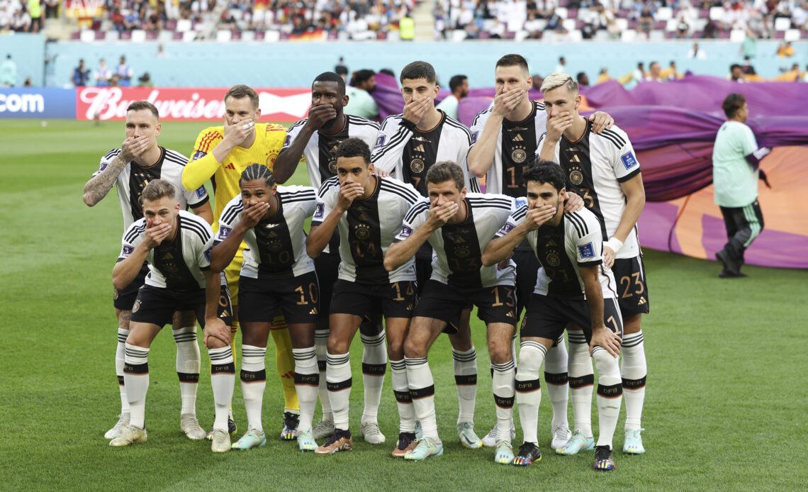 German soccer players cover their mouths in team photo protest ahead of World Cup match in Qatar