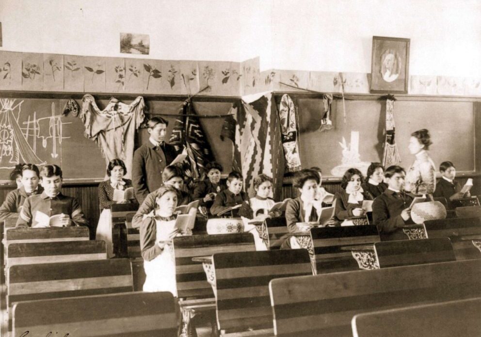 PHOTO: Male and female students read in class at the Carlisle Indian School, in Carlisle, Penn., 1901.