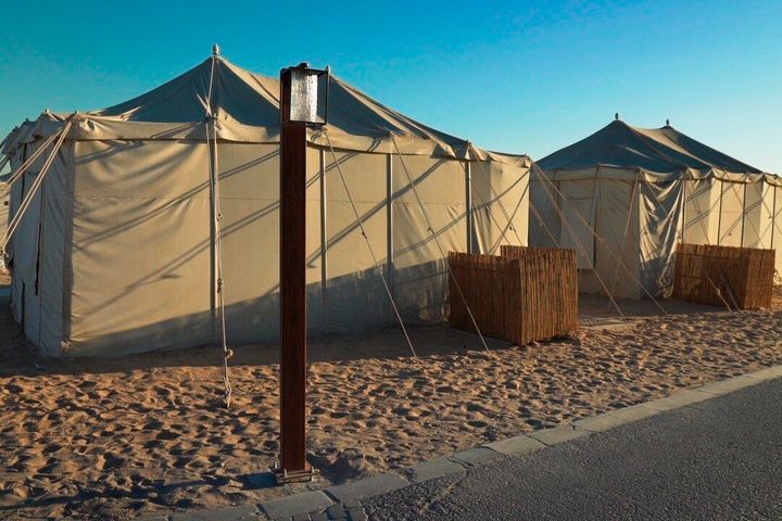 Visitors who found hotels in central Doha booked up or far beyond their budget have settled for the faraway, dust-blown tent village in Al Khor, where there are no locks on tents nor beers on draft..