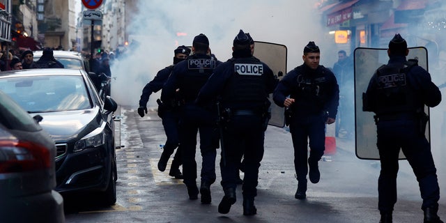 Clashes with French police during a demonstration near the Rue d'Enghien took place after gunshots were fired earlier Friday, killing and injuring several people in a central district of Paris.  