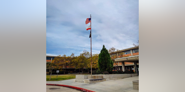 FILE-A Black Lives Matter flag flies above San Diego Unified Central Office in February 2021 to start Black History Month.