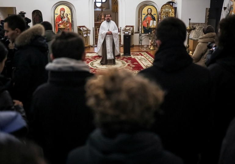 Volunteers and other mourners attend a memorial service for Andrew Bagshaw, one of the two British volunteers killed in eastern Ukraine while attempting a rescue from Soledar, amid Russia's attack on Ukraine, in Kyiv, Ukraine January 29, 2023. REUTERS/Gleb Garanich