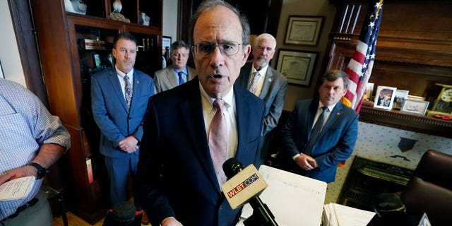 Mississippi Lt. Gov. Delbert Hosemann, a Republican, is backed by some senators as he discusses health care legislation during a news conference in his office at the state Capitol in Jackson, on Jan. 18, 2023.