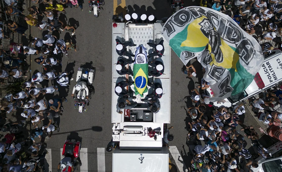 Pelé buried at cemetery in Brazilian city he made famous